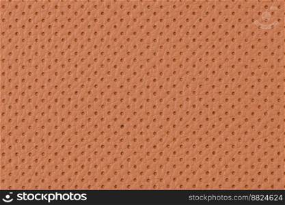 Perforated brown leather texture background, closeup. Bronze backdrop from wrinkle skin, structure of textile.