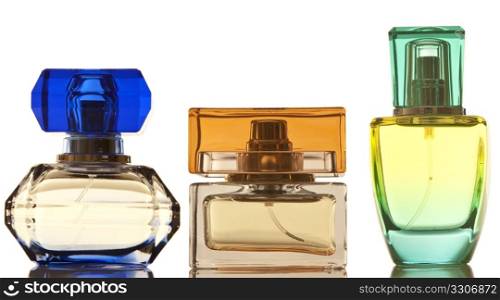 Perfume in a glass bottles on white background