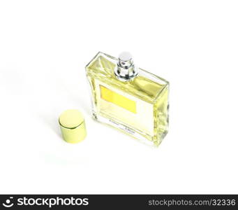 Perfume in beautiful yelow color bottle isolated on white background