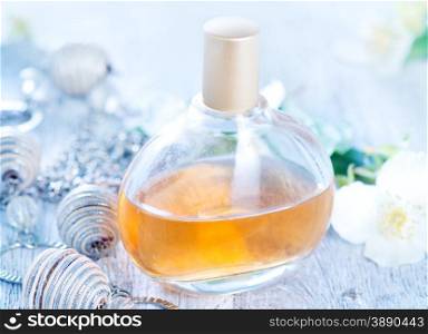 perfume in bottle and on atable