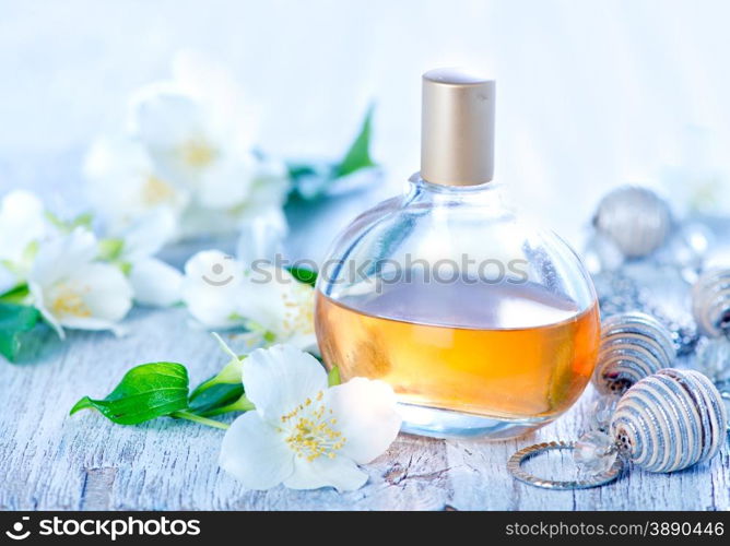 perfume in bottle and on atable