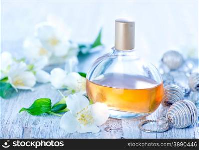 perfume in bottle and on atable