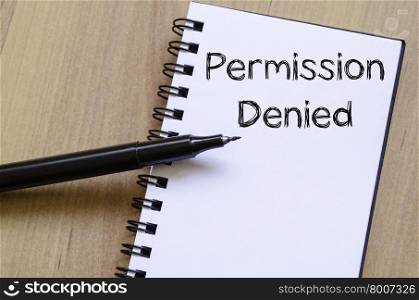 Permission denied text concept write on notebook with pen