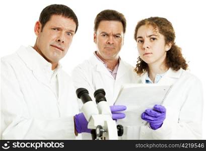 Perplexed, confused scientists looking at lab results. White background.