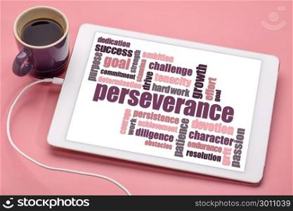 perseverance word cloud on a digital tablet with a cup of coffee