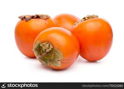 Persimmon fruits on white background.