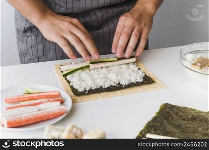 person adding ingredients rice