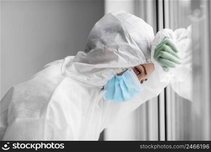 person being tired after disinfecting dangerous area