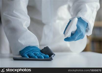 person disinfecting biohazard area. Resolution and high quality beautiful photo. person disinfecting biohazard area. High quality beautiful photo concept