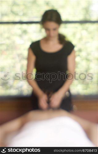 Person getting a massage from a massage therapist