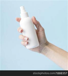 person holding disinfection bottle . Resolution and high quality beautiful photo. person holding disinfection bottle . High quality and resolution beautiful photo concept