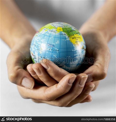 person holding earth globe. Resolution and high quality beautiful photo. person holding earth globe. High quality and resolution beautiful photo concept