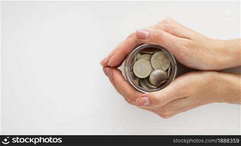 person holding jar with coins . Resolution and high quality beautiful photo. person holding jar with coins . High quality and resolution beautiful photo concept