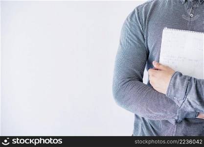 person holding notebook studio