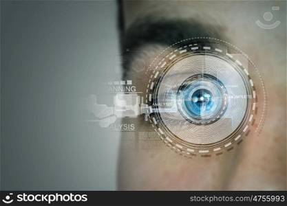 Person identification. Close up of man eye in process of scanning