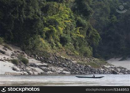 Person in a boat in River Mekong, Sainyabuli Province, Laos