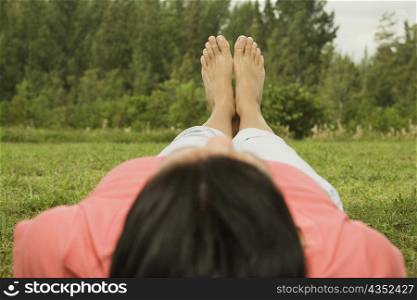 Person lying on the grass
