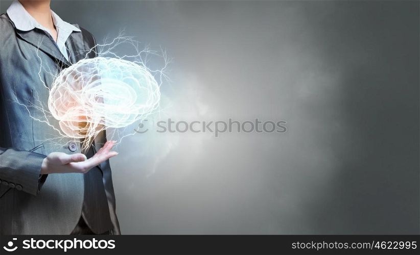 Person of great mind. Close view of businesswoman holding in hands human mind concept