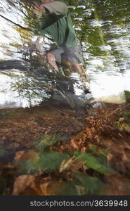 Person on mountain bike in countryside