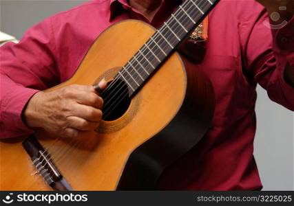 Person playing a guitar, Havana, Cuba