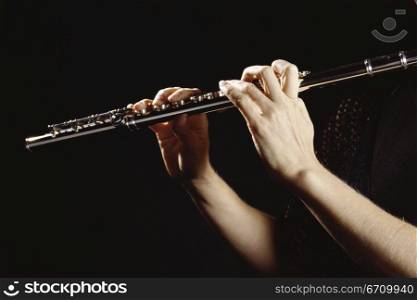 Person playing the flute