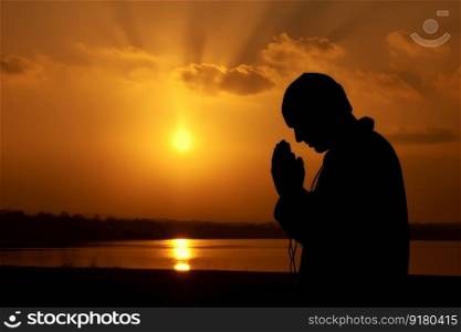 Person praying god sunset. Happy summer. Fictional person. Generate Ai. Person praying god sunset. Generate Ai