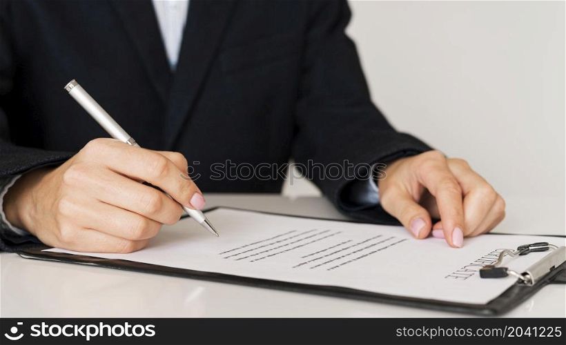 person signing certificate front view