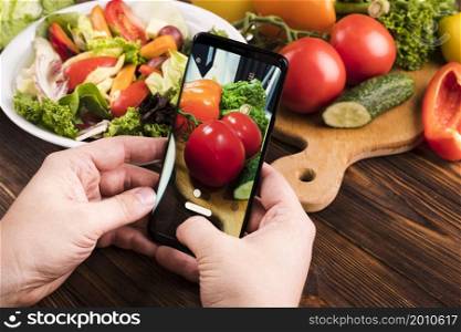 person taking tomatoes