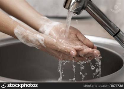 person washing hands sink. High resolution photo. person washing hands sink. High quality photo