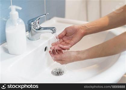 person washing hands with soap 2. Resolution and high quality beautiful photo. person washing hands with soap 2. High quality beautiful photo concept