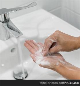 person washing hands with soap . High resolution photo. person washing hands with soap . High quality photo