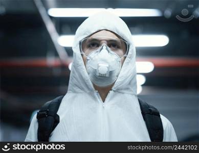 person with face mask wearing protective equipment against bio hazard