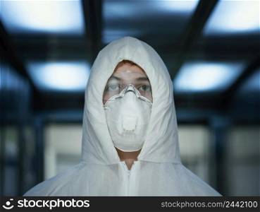 person with face mask wearing protective equipment against bio hazard 3