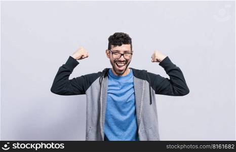 Person with Happy face raising arms in victory gesture isolated, winner person celebrating victory isolated, excited man raising arms celebrating victory
