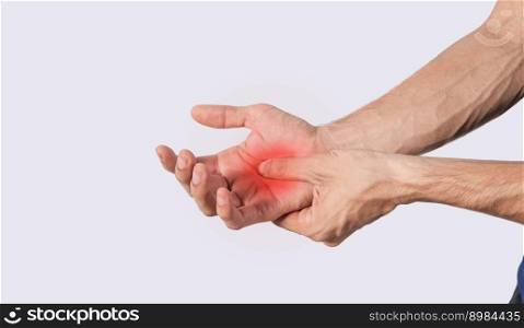 Person with palm pain, concept of a man with pain in the hands, man with arthritis rubbing, person with pain in the hands