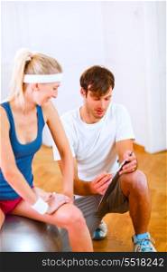 Personal trainer working with client&#xA;