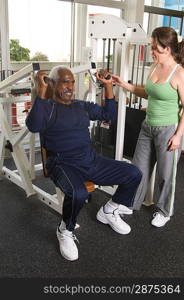 Personal Trainer Working with Senior Man