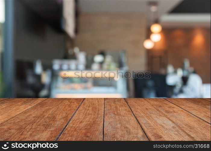Perspective brown wood with blurred coffee shop, stock photo