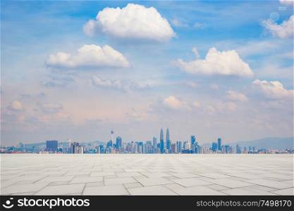 Perspective empty marble floor in front of city skyline background