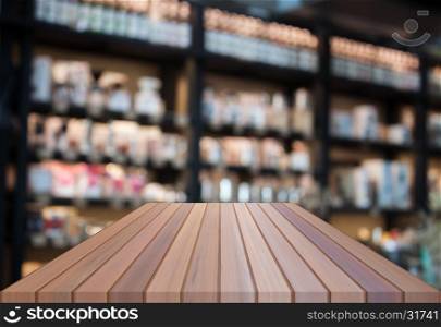 Perspective luxury top wooden with blurred coffee shop background. product display template