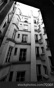 Perspective of courtyard in Paris. Black and white image