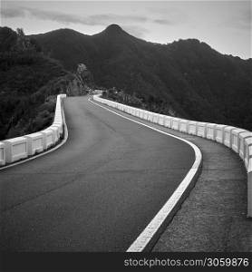 Perspective of road with bends, Tenerife, The Canaries. Black and white photography. Landscape