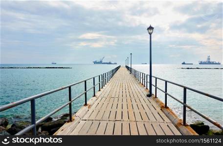 Perspective of the long walking pier by the sea in Limassol, Cyprus - Landscape