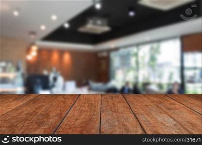 Perspective top wooden with blurred cafe interior for background. product display template