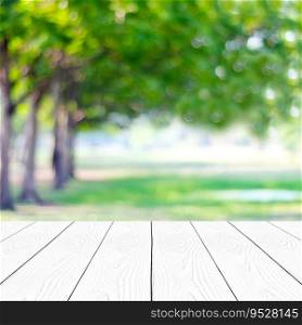 Perspective white wood over blur trees with bokeh background, product display montage, spring and summer season