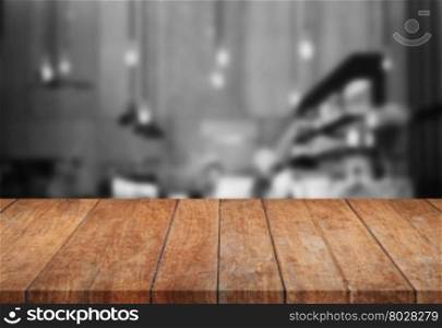 Perspective wooden tabletop with black and white background, stock photo