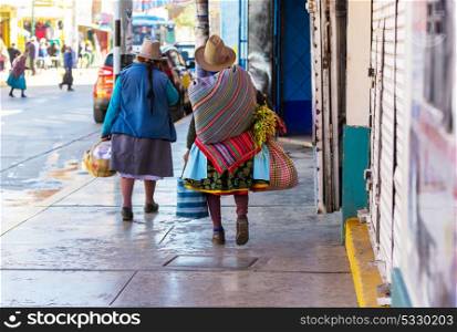 Peruvian people in city street