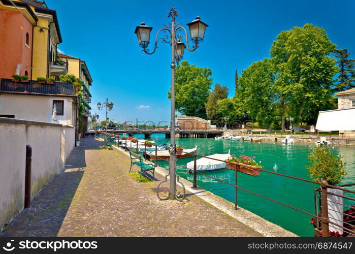 Peschiera del Garda colorful harbor and boats view, Lago di Garda, Veneto region of Italy