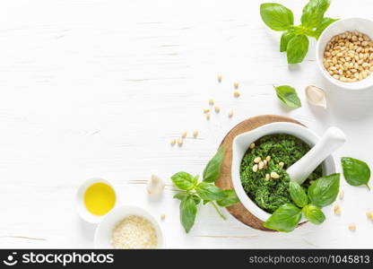 Pesto. Italian basil pesto sauce with culinary ingredients for cooking