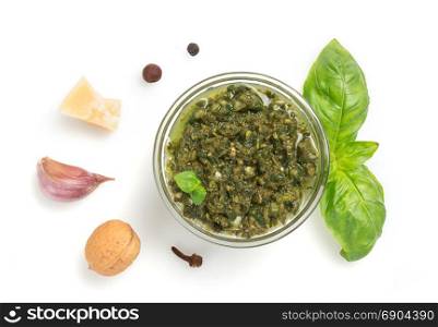 pesto sauce in bowl isolated on white background